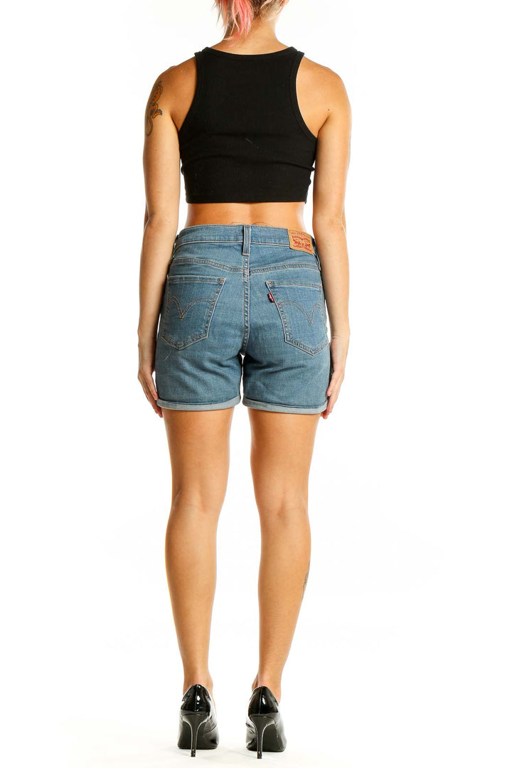 Back view of light blue Levi's denim shorts showing pocket design