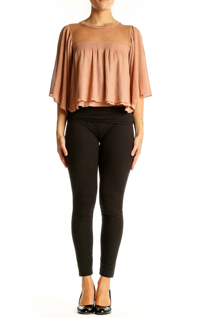 Front view of Zara blush cropped blouse with sheer dotted yoke