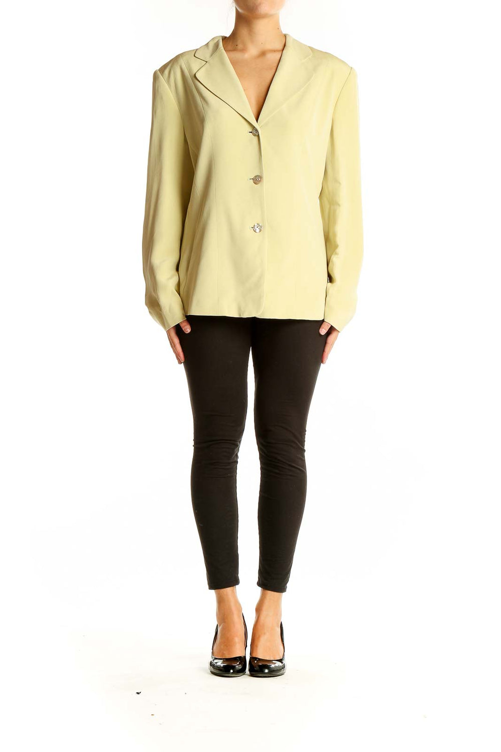 Front view of yellow Casual Corner blazer with three-button closure