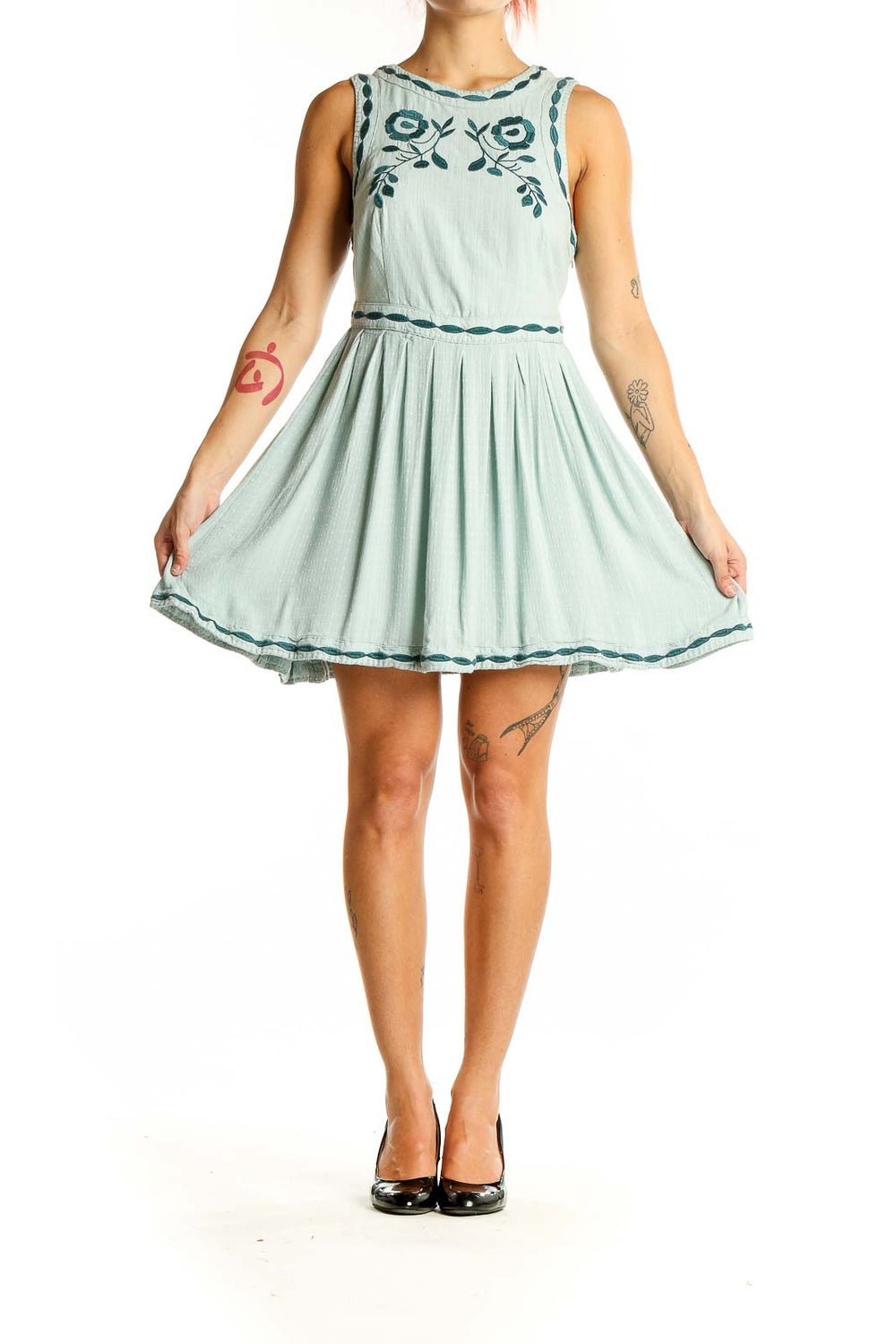 Front view of Free People mint mini dress with teal floral embroidery