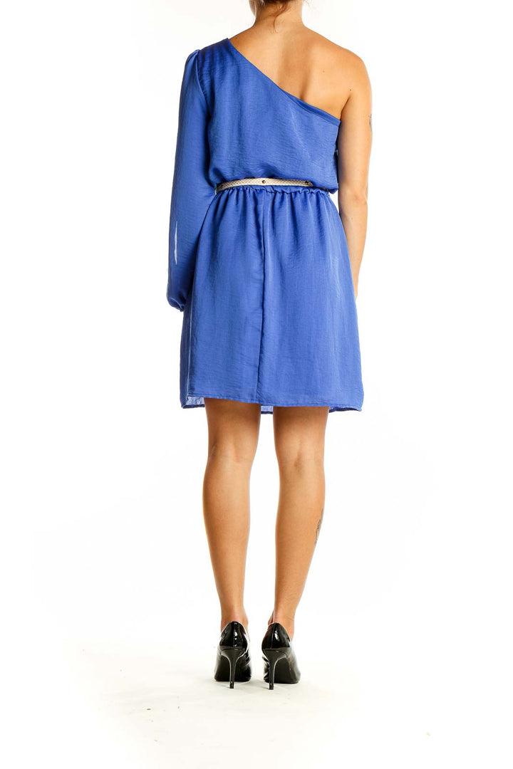 Back view of BCX blue one-shoulder mini dress showing sleeveless side