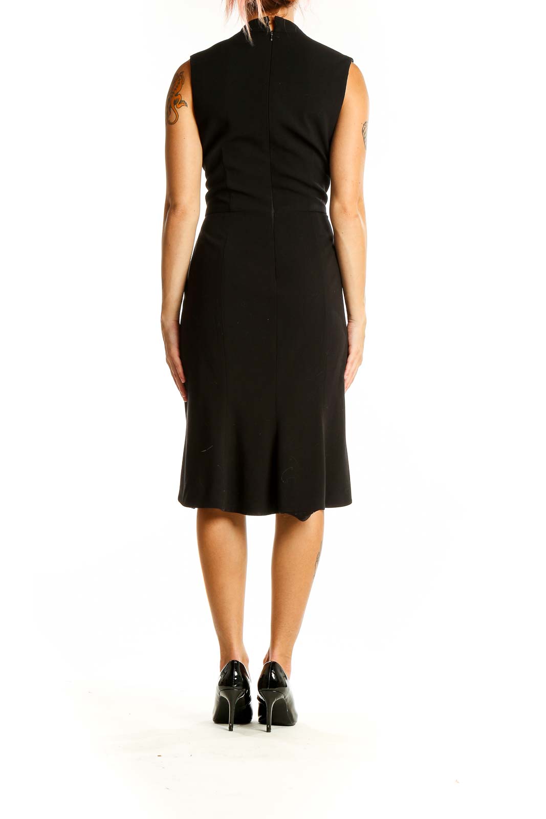 Back view of black sleeveless midi dress showing clean lines and hidden zipper