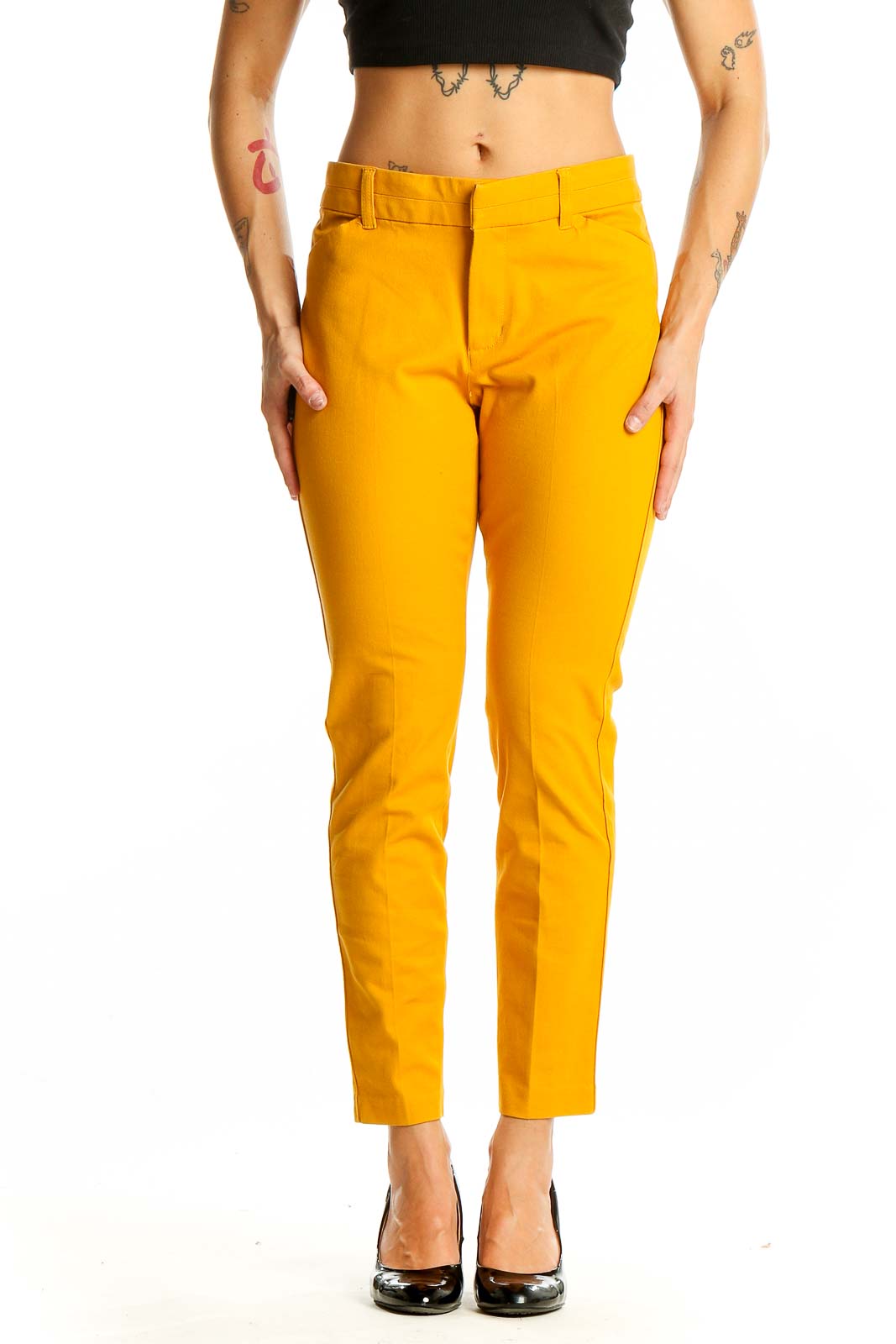 Front view of Gap yellow slim-fit trousers on model