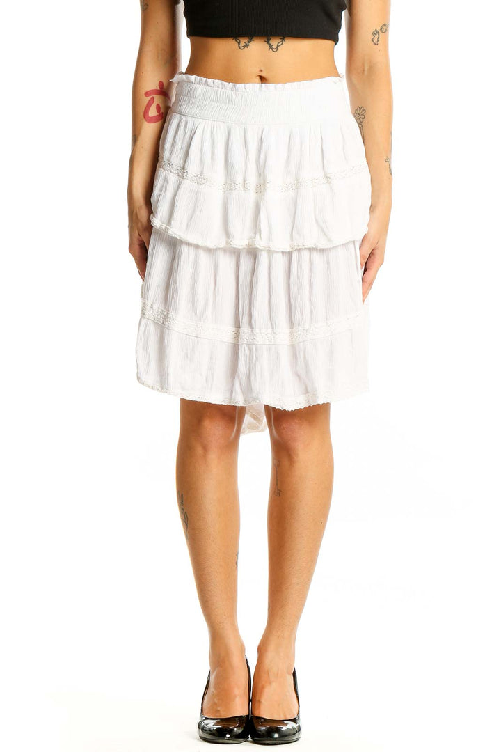 Front view of white tiered rayon midi skirt by Crown & Ivy