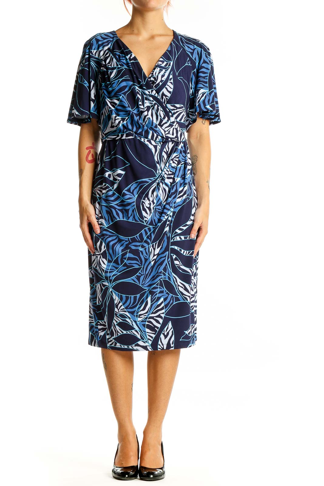 Front view of Maggy London Navy Tropical Print Wrap Midi Dress with V-neckline and flutter sleeves