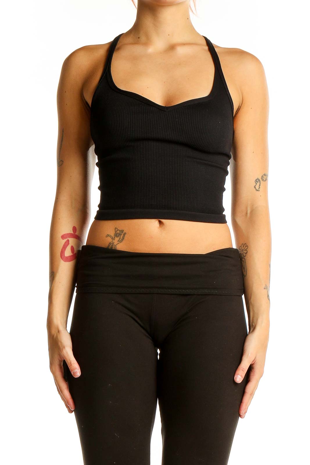 Front view of Free People Movement black ribbed racerback crop top