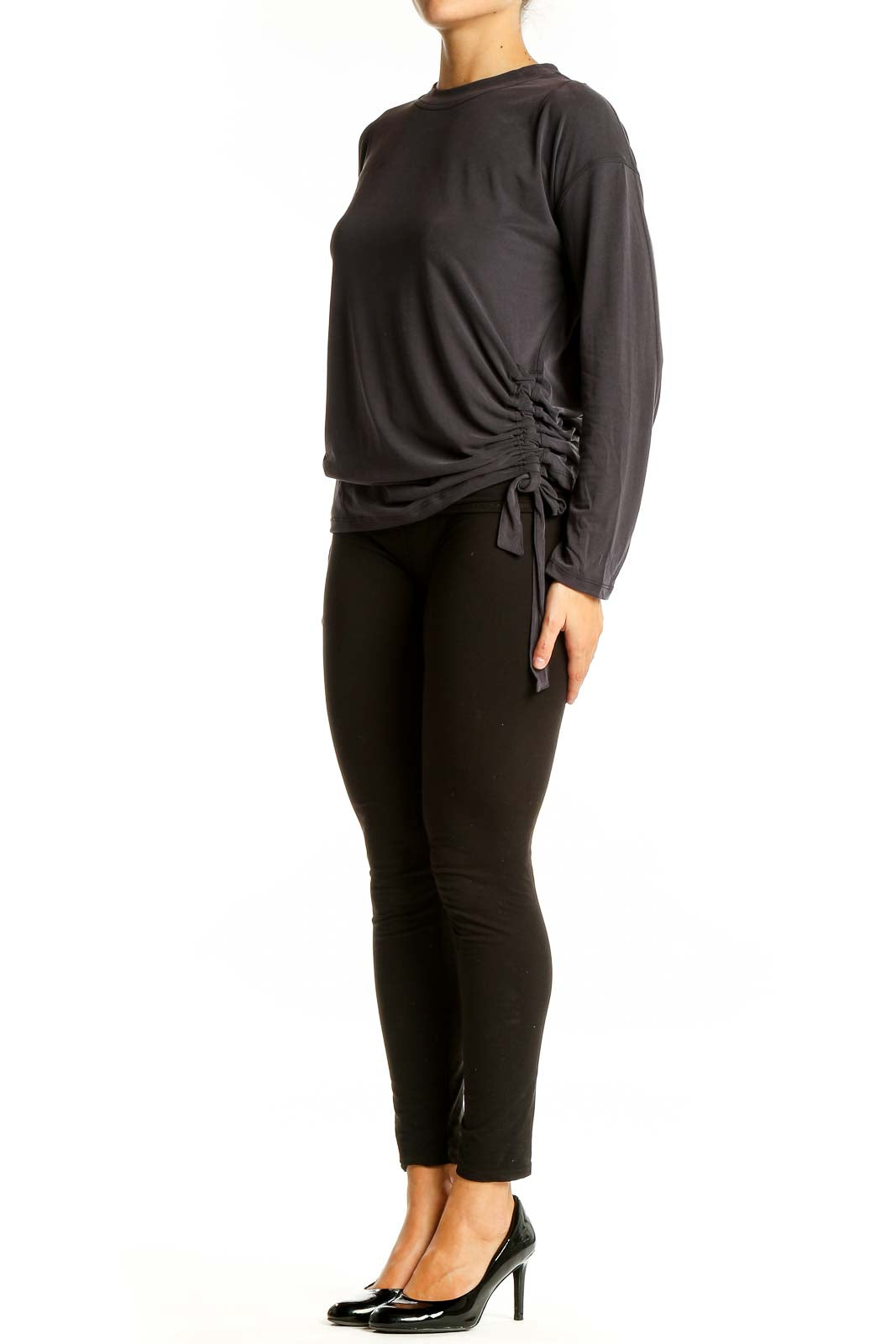 Front view of gray Lululemon long sleeve activewear top with ruched side detail