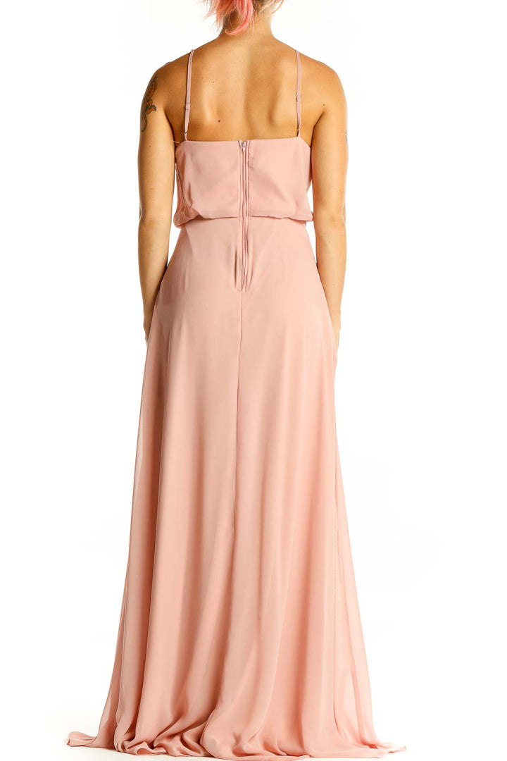 Back view of Birdy Grey blush pink maxi dress showing zipper closure