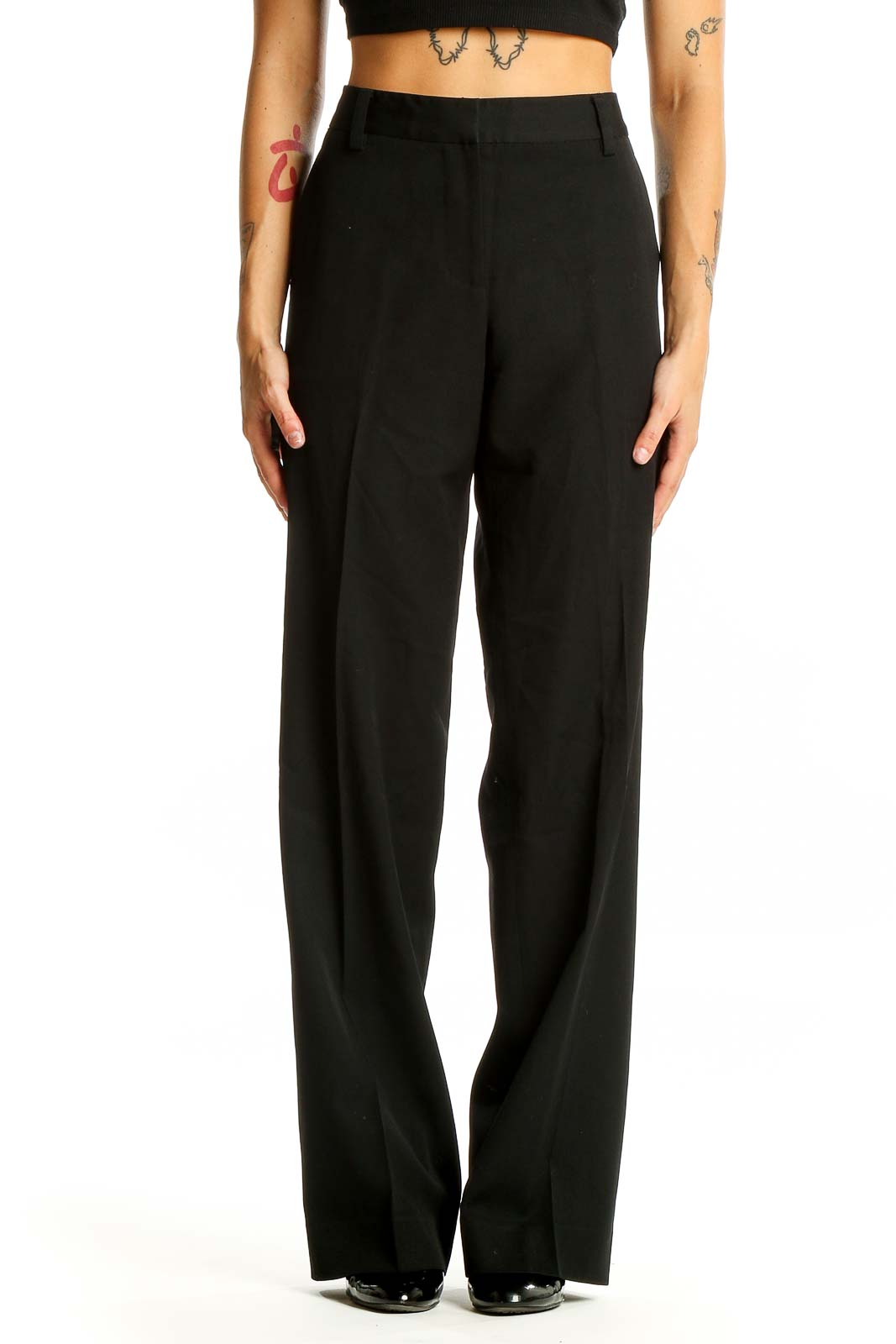 Front view of DKNY black wool wide-leg trousers on model