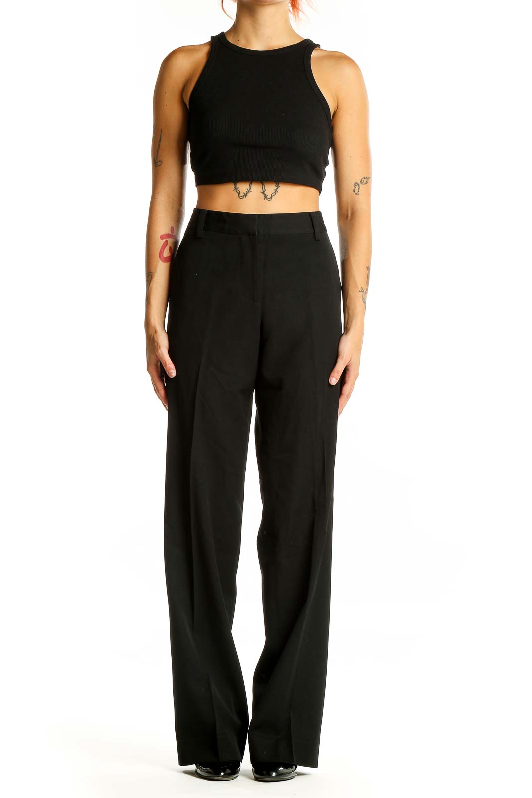 Front view of DKNY black wool wide-leg trousers on model