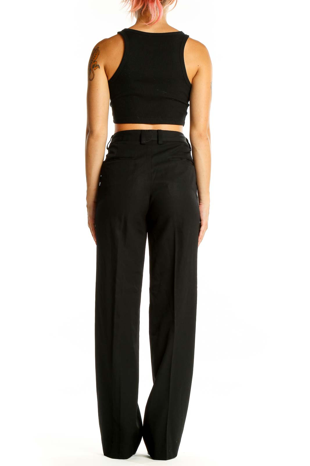 Back view of DKNY black wool wide-leg trousers on model