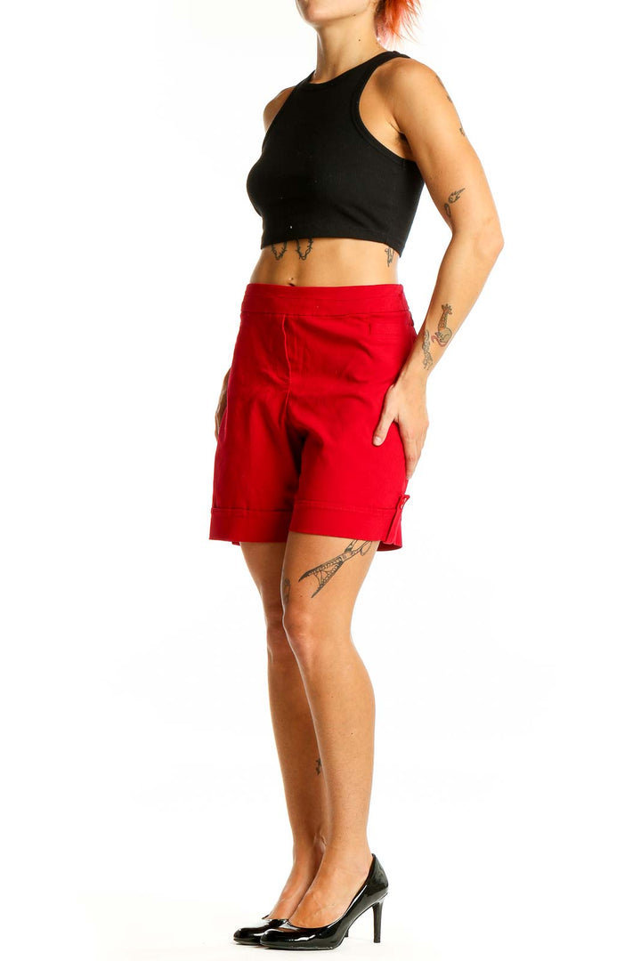 Front view of red Briggs Bermuda shorts on model