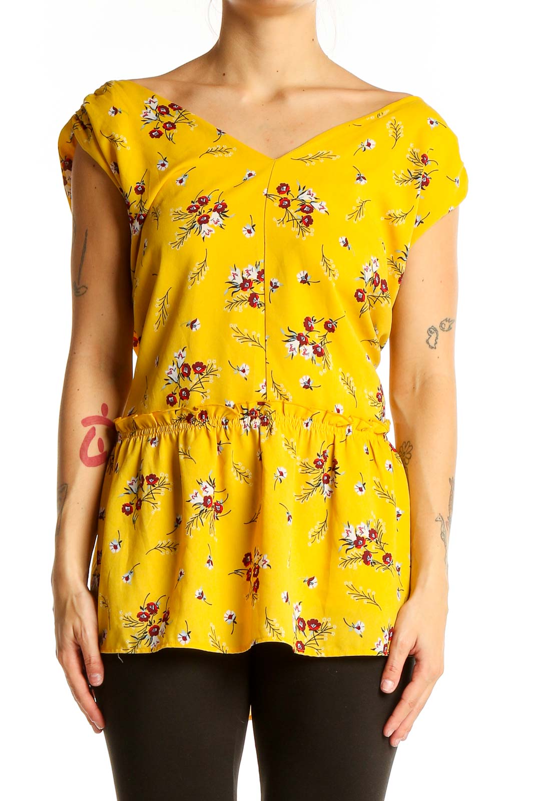 Front view of LOFT yellow floral peplum blouse with cap sleeves and V-neckline