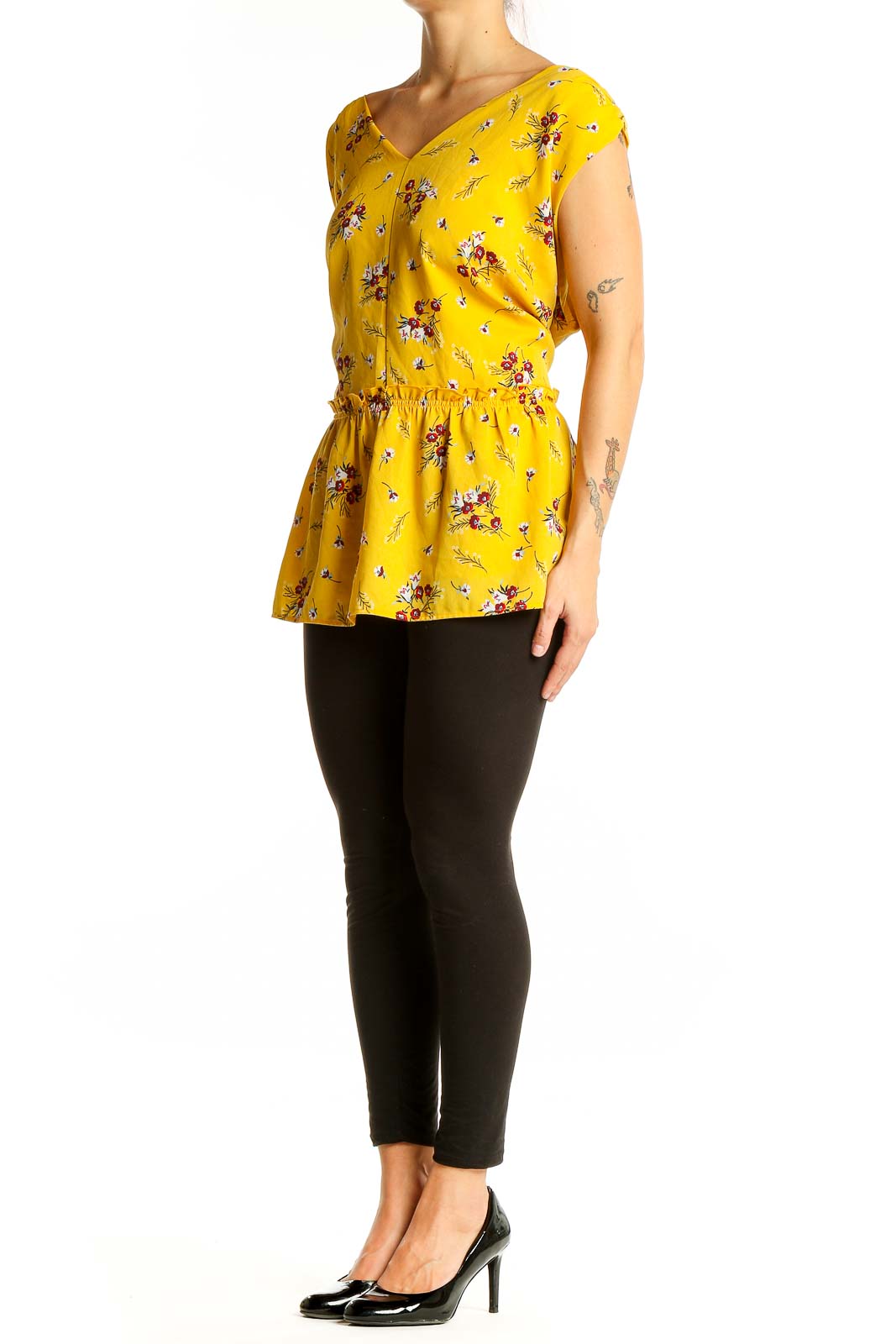 Front view of LOFT yellow floral peplum blouse with cap sleeves and V-neckline