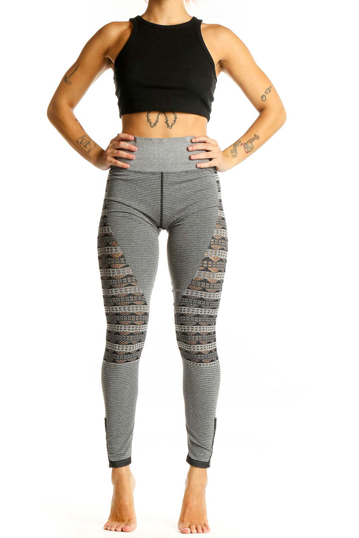 Front view of gray patterned high-waist activewear leggings from Free People