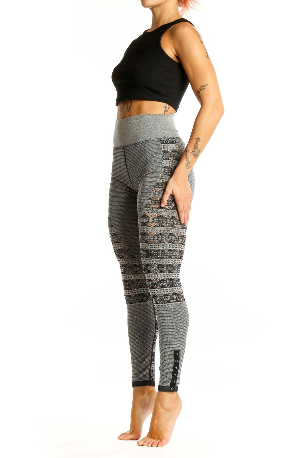 Front view of gray patterned high-waist activewear leggings from Free People