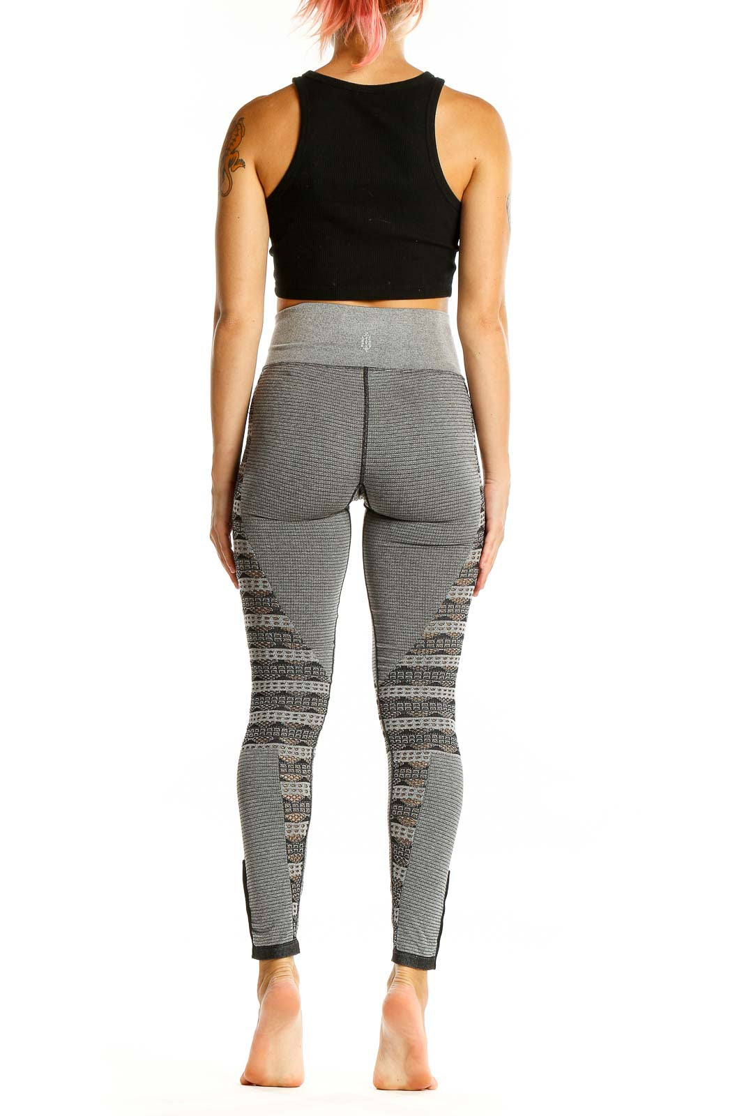 Back view of gray patterned high-waist activewear leggings from Free People