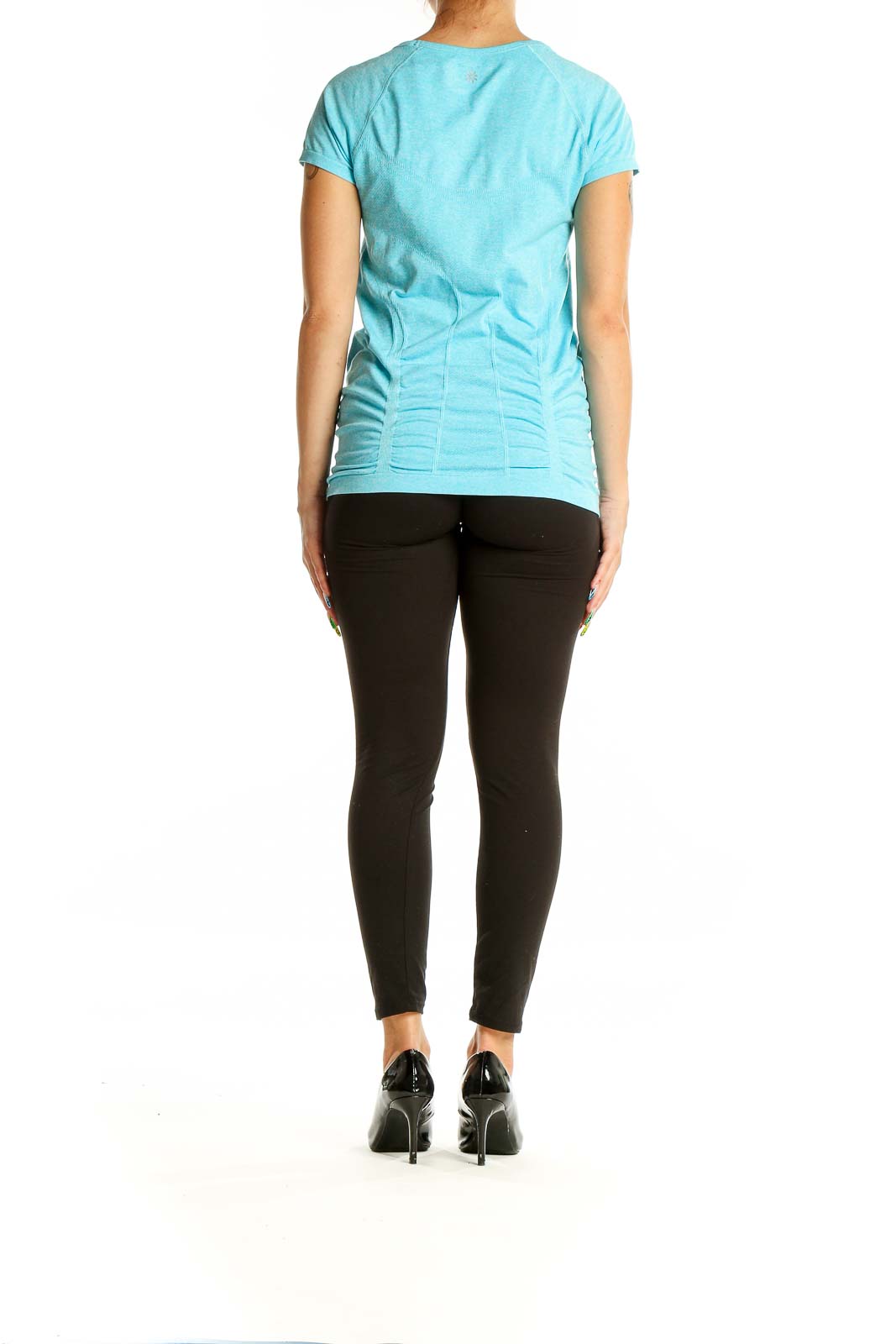 Back view of Athleta aqua short sleeve workout top showing form-fitting design