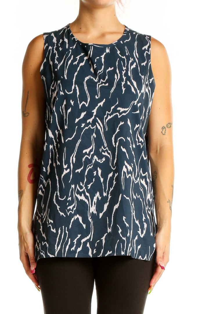 Front view of Athleta navy sleeveless top with white abstract print