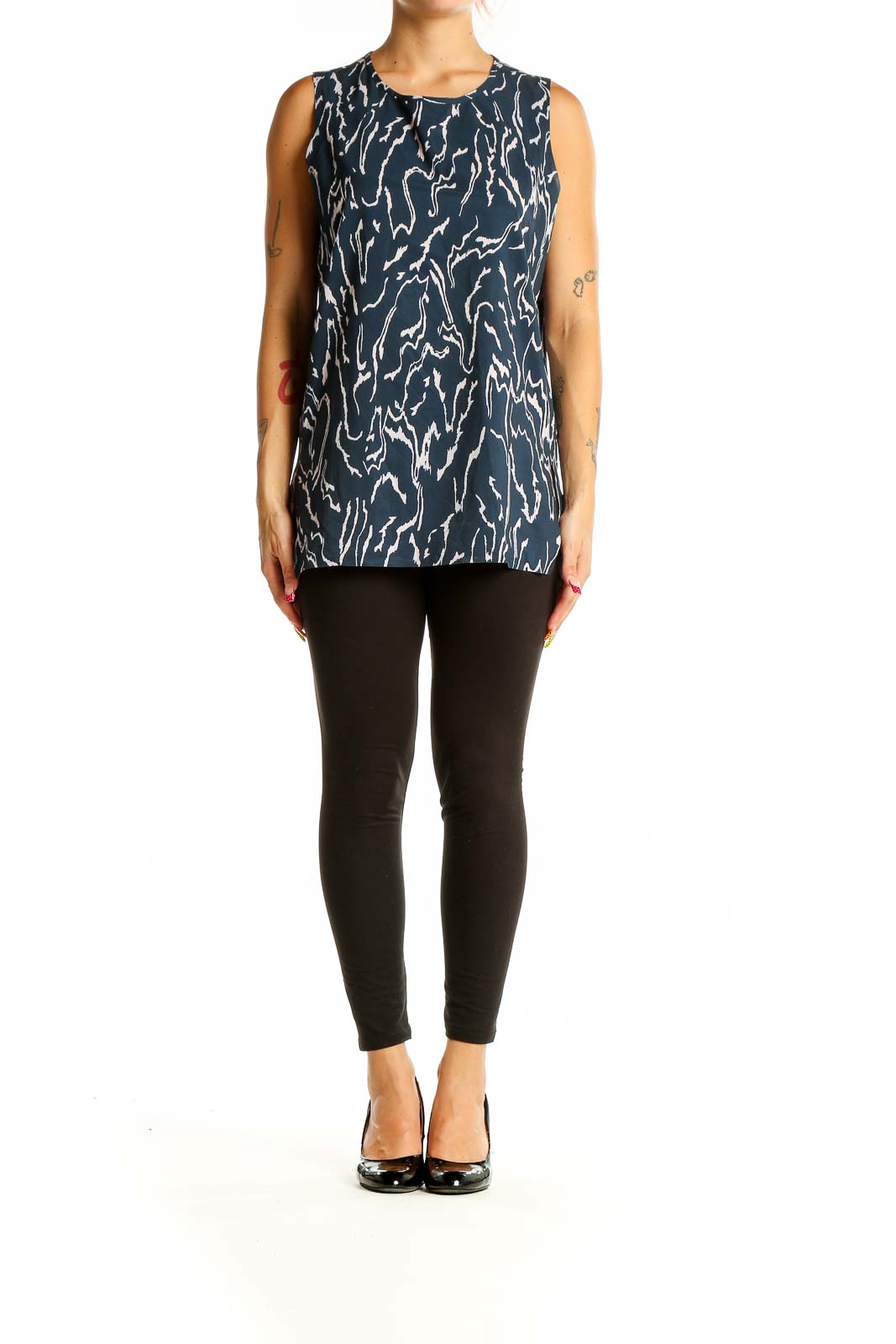 Front view of Athleta navy sleeveless top with white abstract print