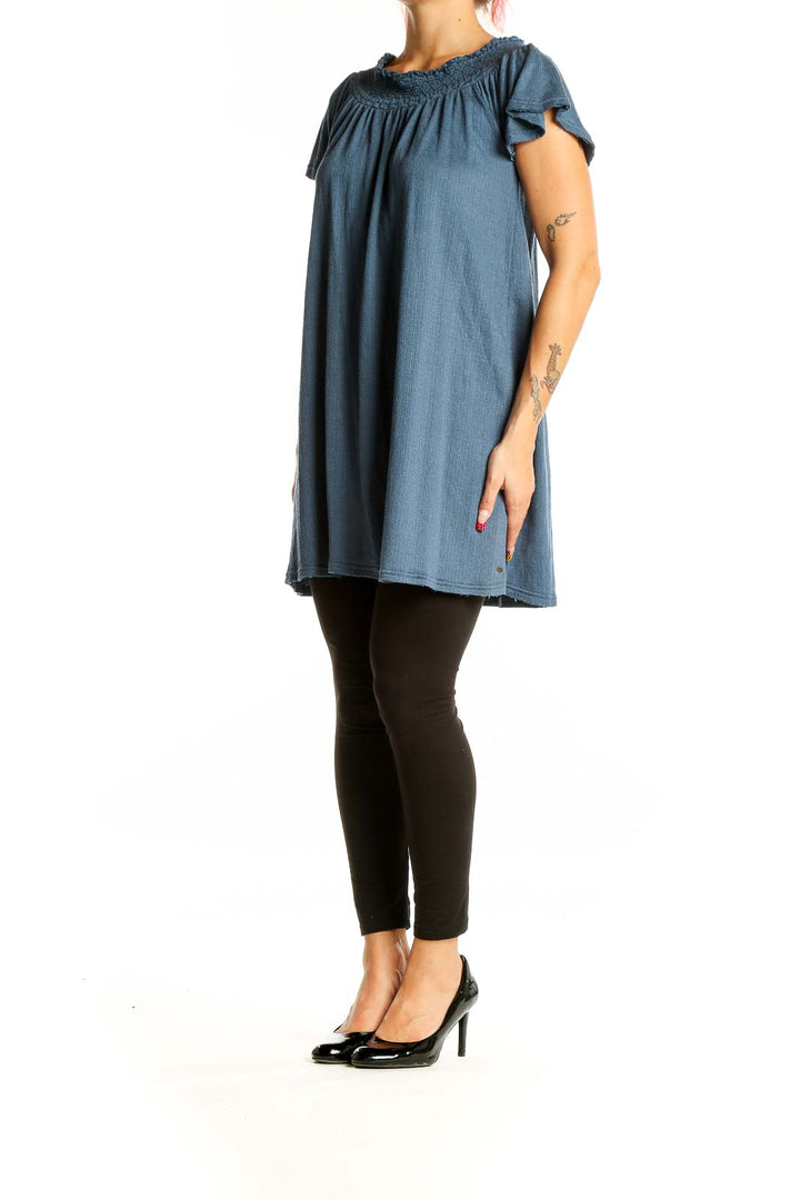 Front view of blue O'Neill off-shoulder mini dress with flutter sleeves