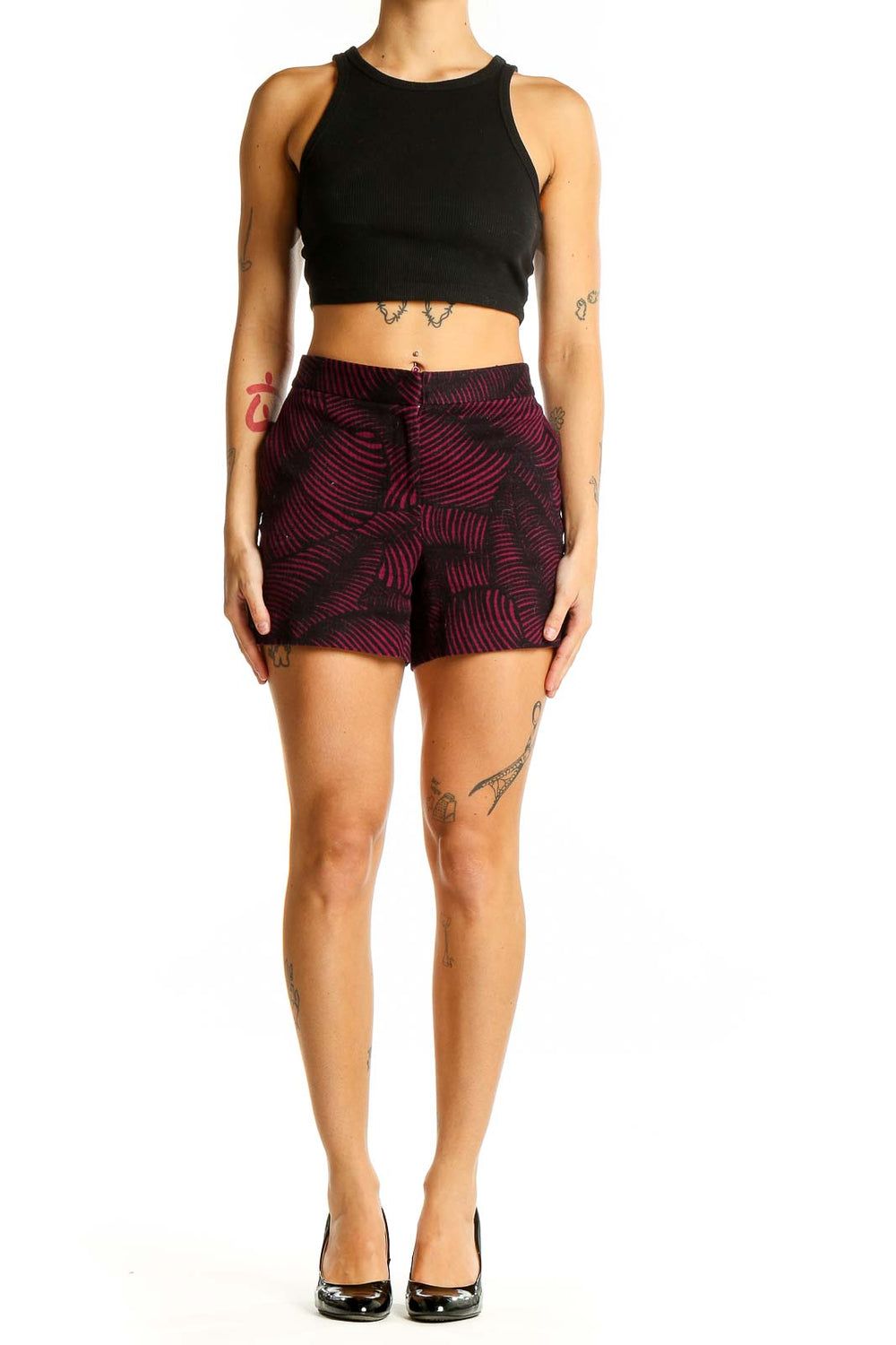 Front view of Ann Taylor burgundy shorts with black leaf-like pattern