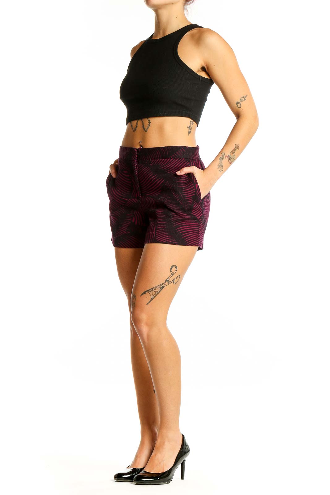 Front view of Ann Taylor burgundy shorts with black leaf-like pattern