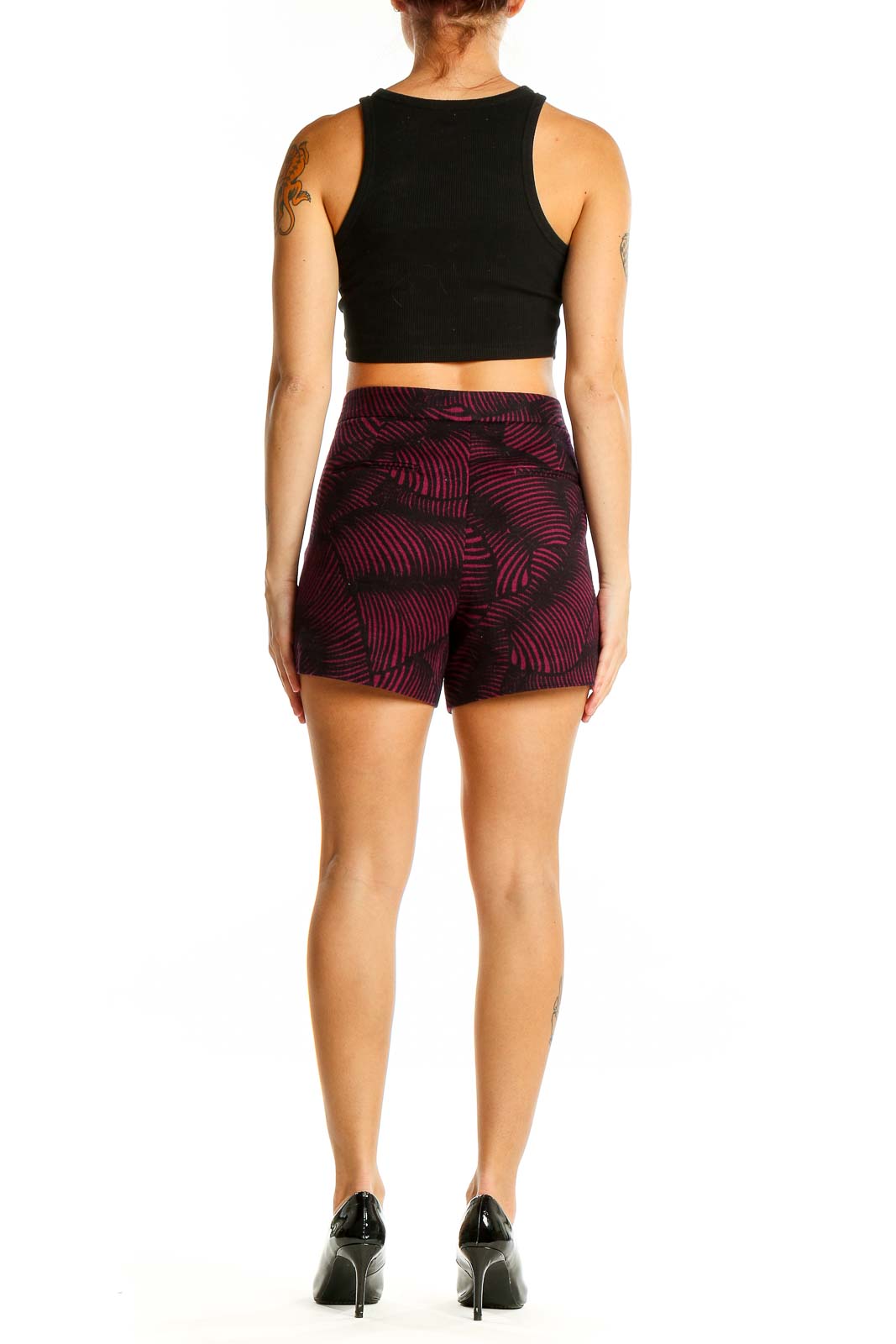 Back view of Ann Taylor burgundy patterned shorts on model