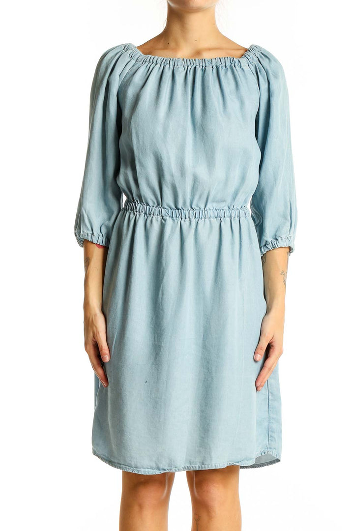 Front view of light blue Lyocell dress with gathered waist and off-shoulder neckline