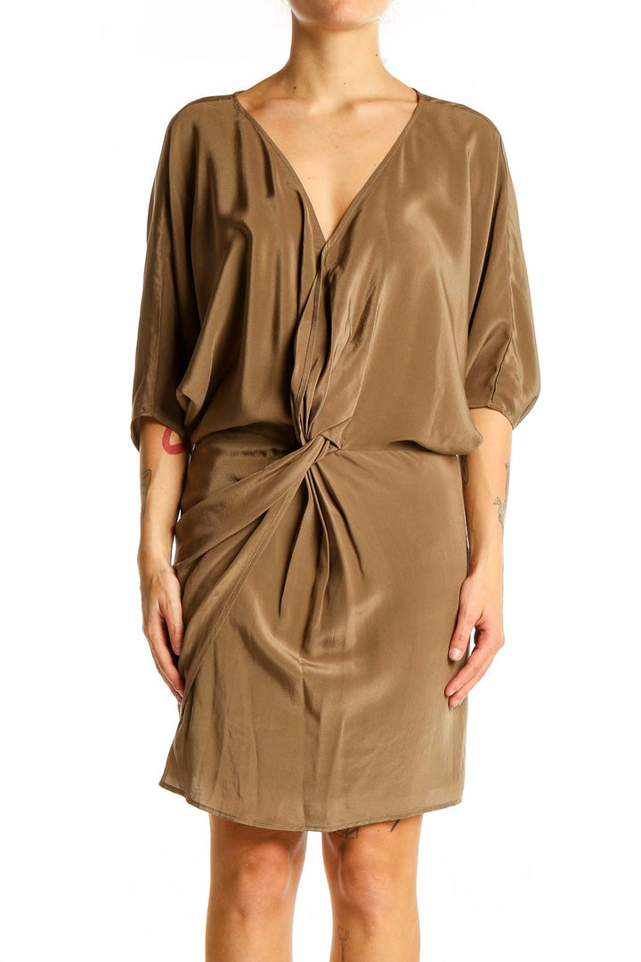 Front view of camel Amour Vert draped wrap dress with V-neckline