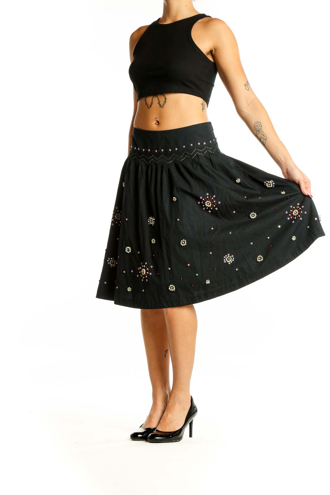 Front view of Odille black cotton A-line skirt with sequin embellishments