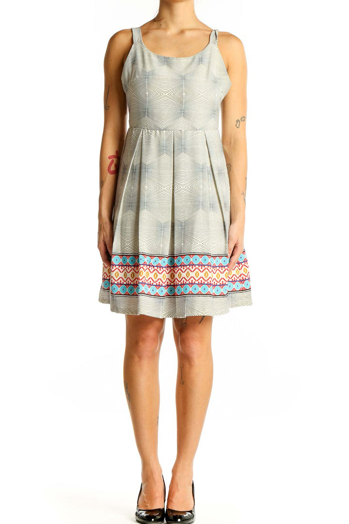 Front view of Freeway gray sleeveless dress with geometric print and colorful border