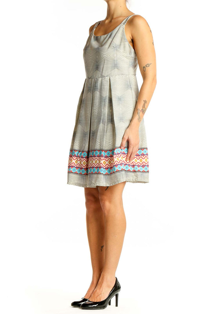 Front view of Freeway gray sleeveless dress with geometric print and colorful border