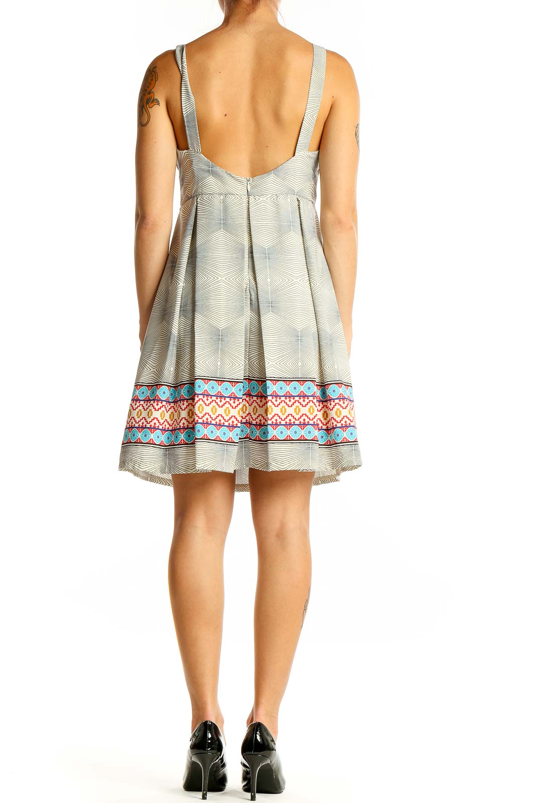 Back view of Freeway gray sleeveless dress showing pleated skirt and low back