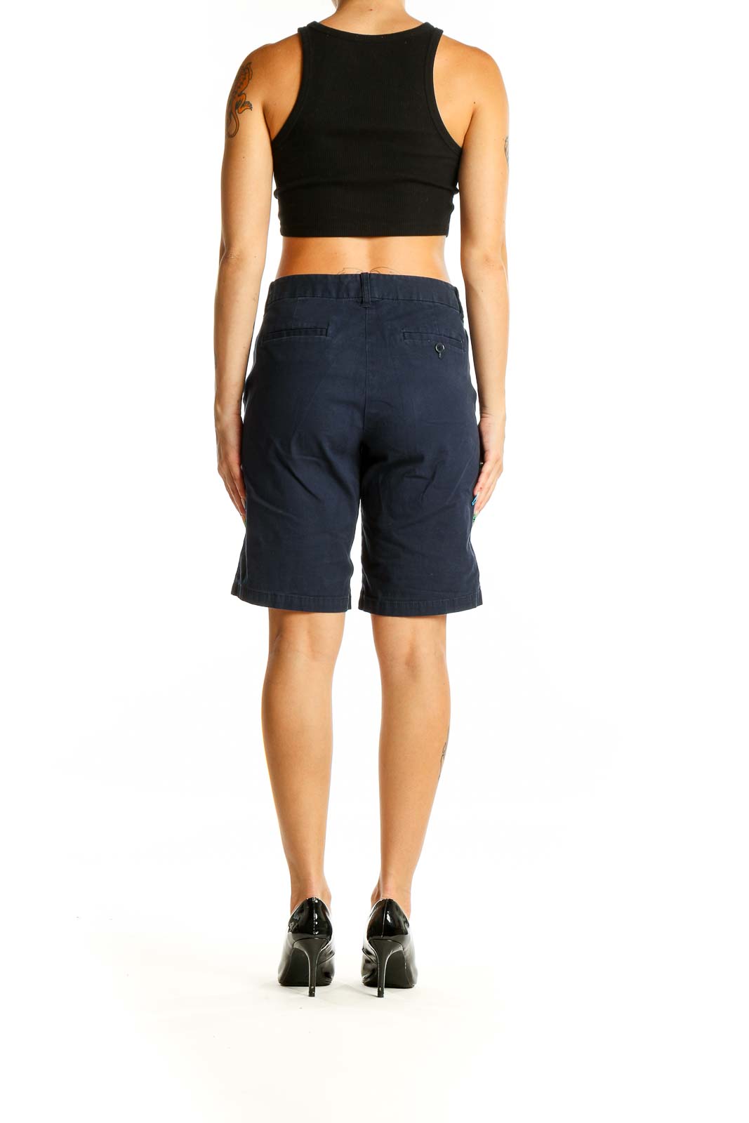 Back view of J.Crew navy Bermuda shorts on model