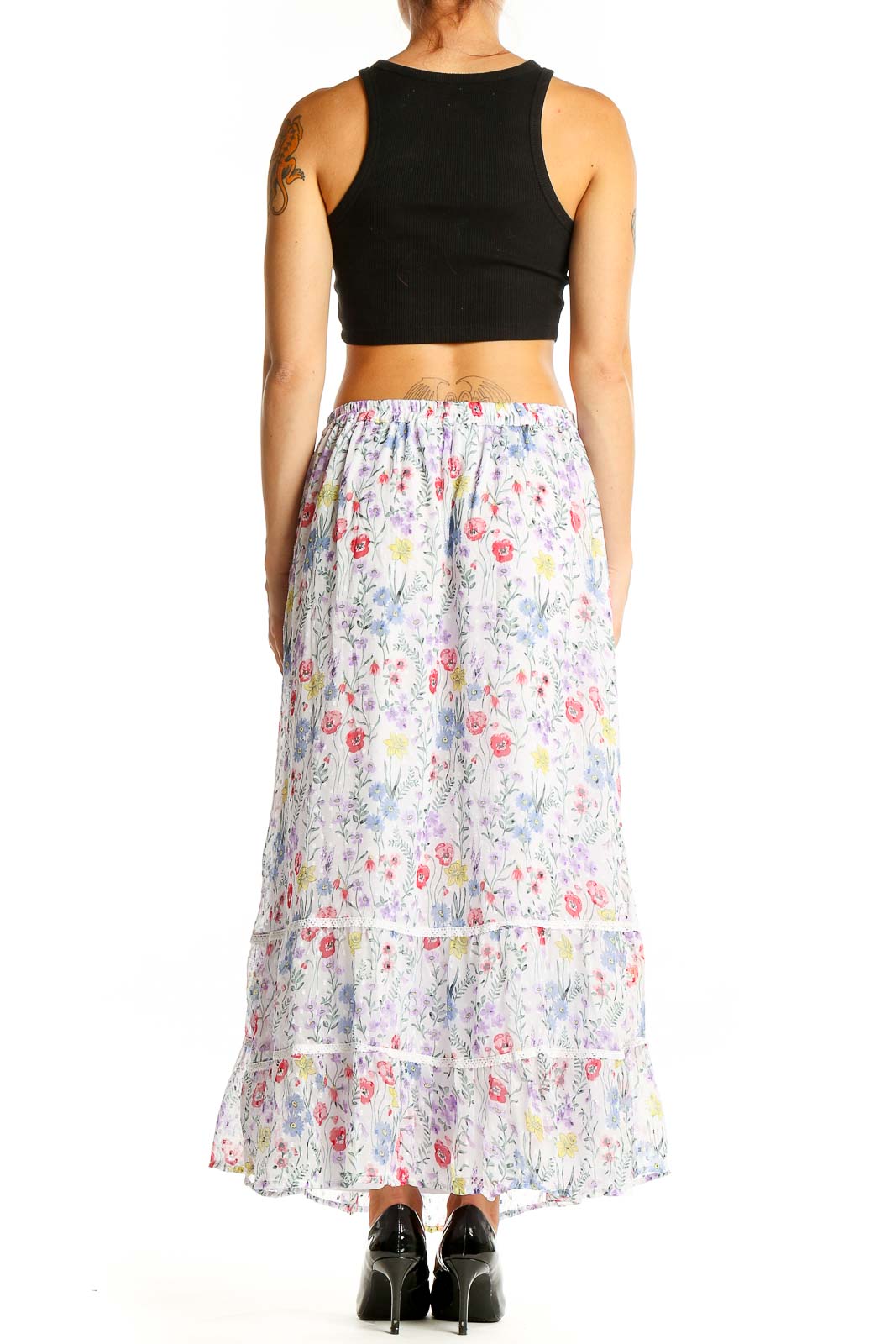 Back view of New Direction white floral tiered maxi skirt showing full length and pattern