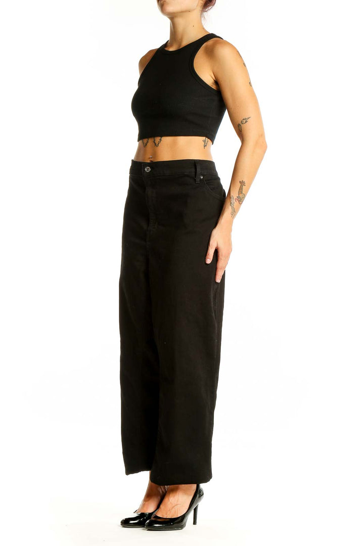 Front view of Levi's black high-waisted wide-leg jeans on model