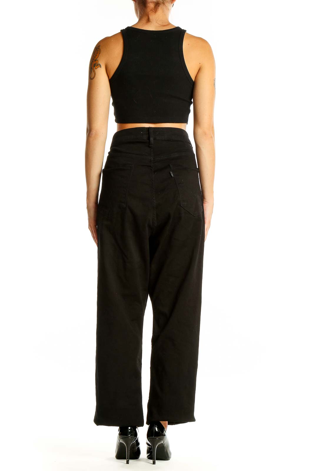 Back view of Levi's black high-waisted wide-leg jeans on model