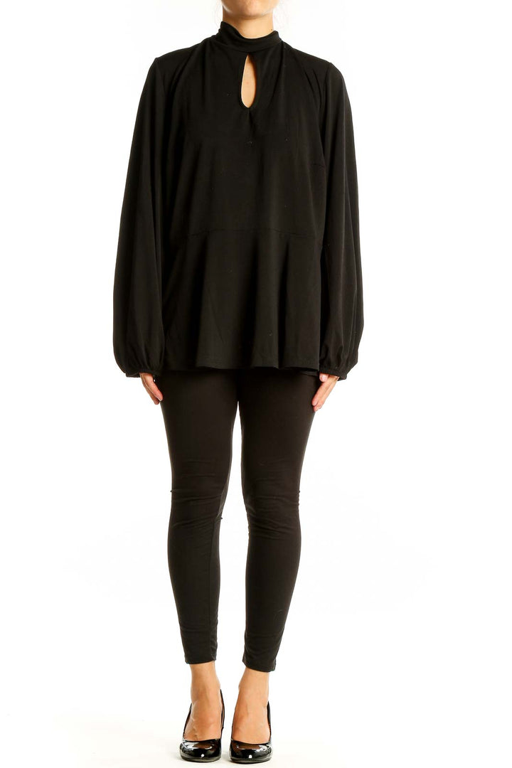 Front view of Eloquii black peplum top with keyhole neckline and long sleeves