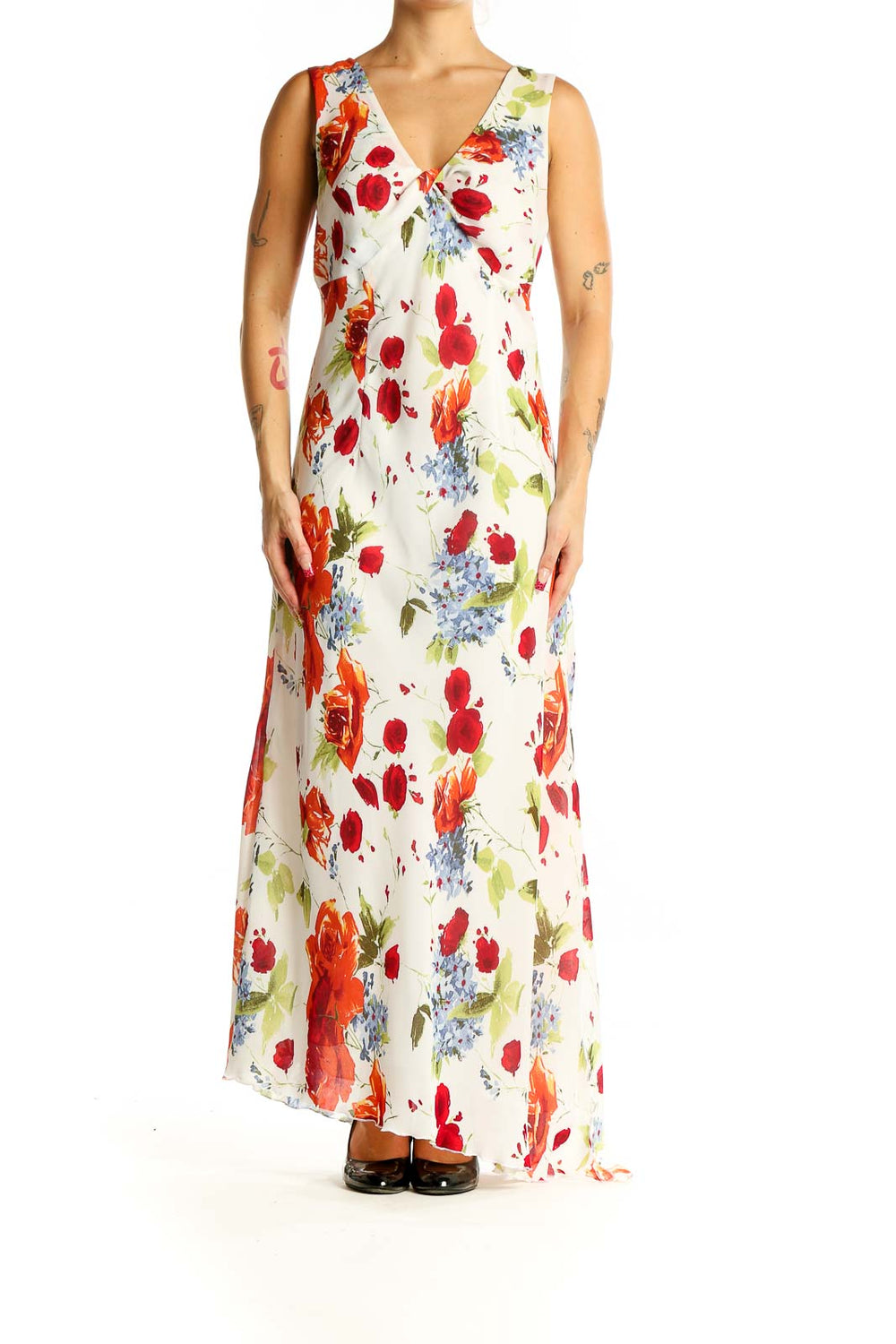 Front view of Tribal white floral maxi dress with red, orange, and blue flowers