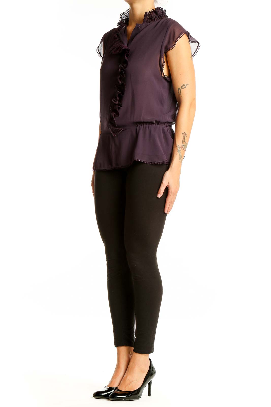 Front view of purple sleeveless blouse with ruffled neckline