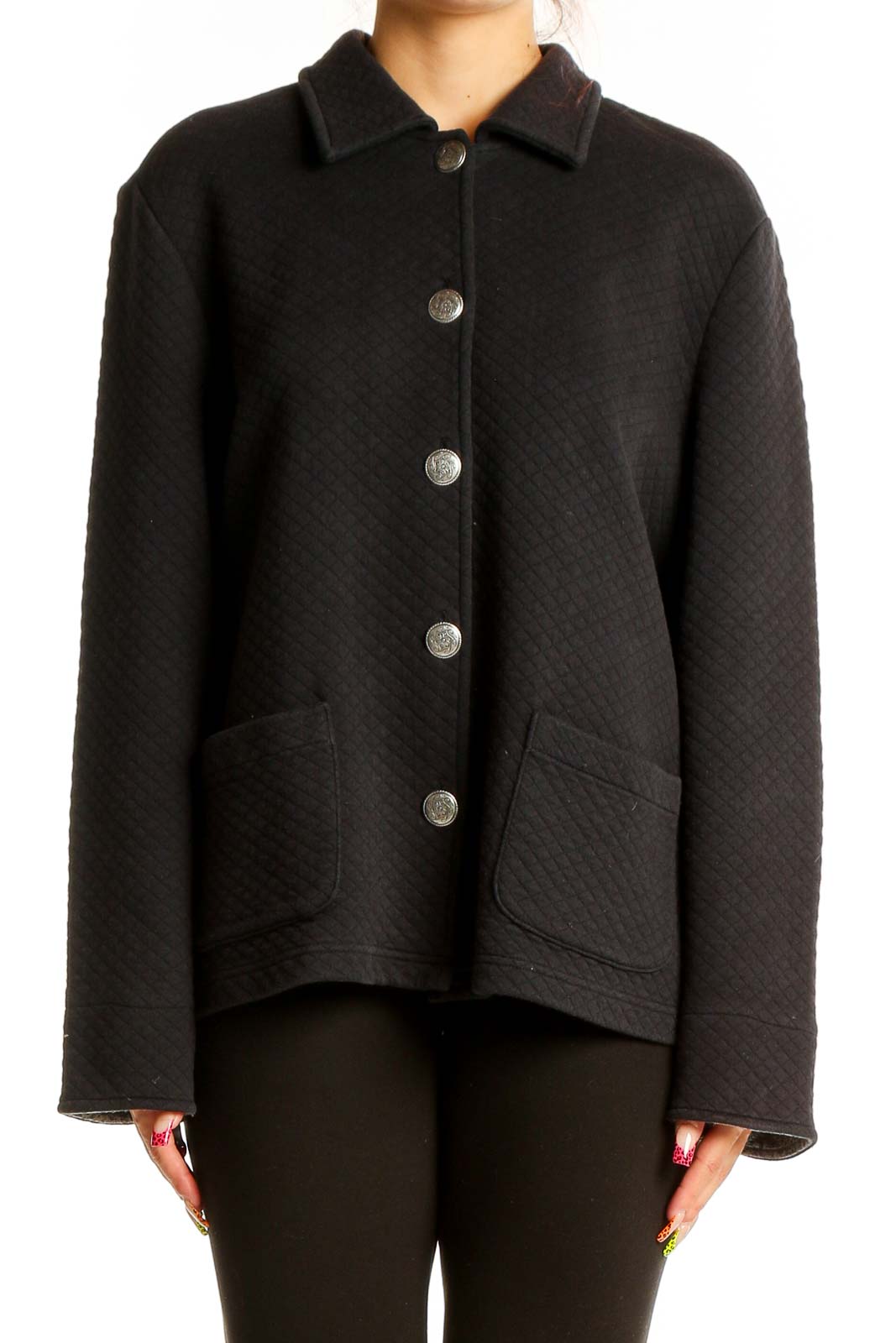 Front view of Koret black quilted button-up jacket with silver buttons