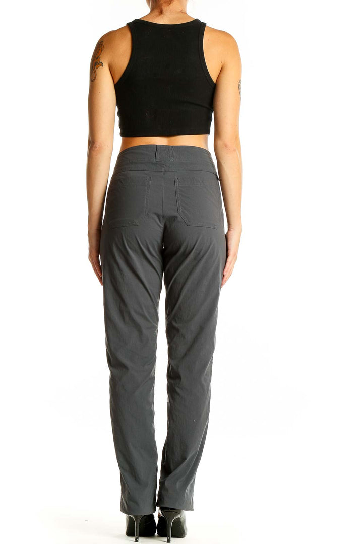 Back view of gray Exofficio activewear pants on model