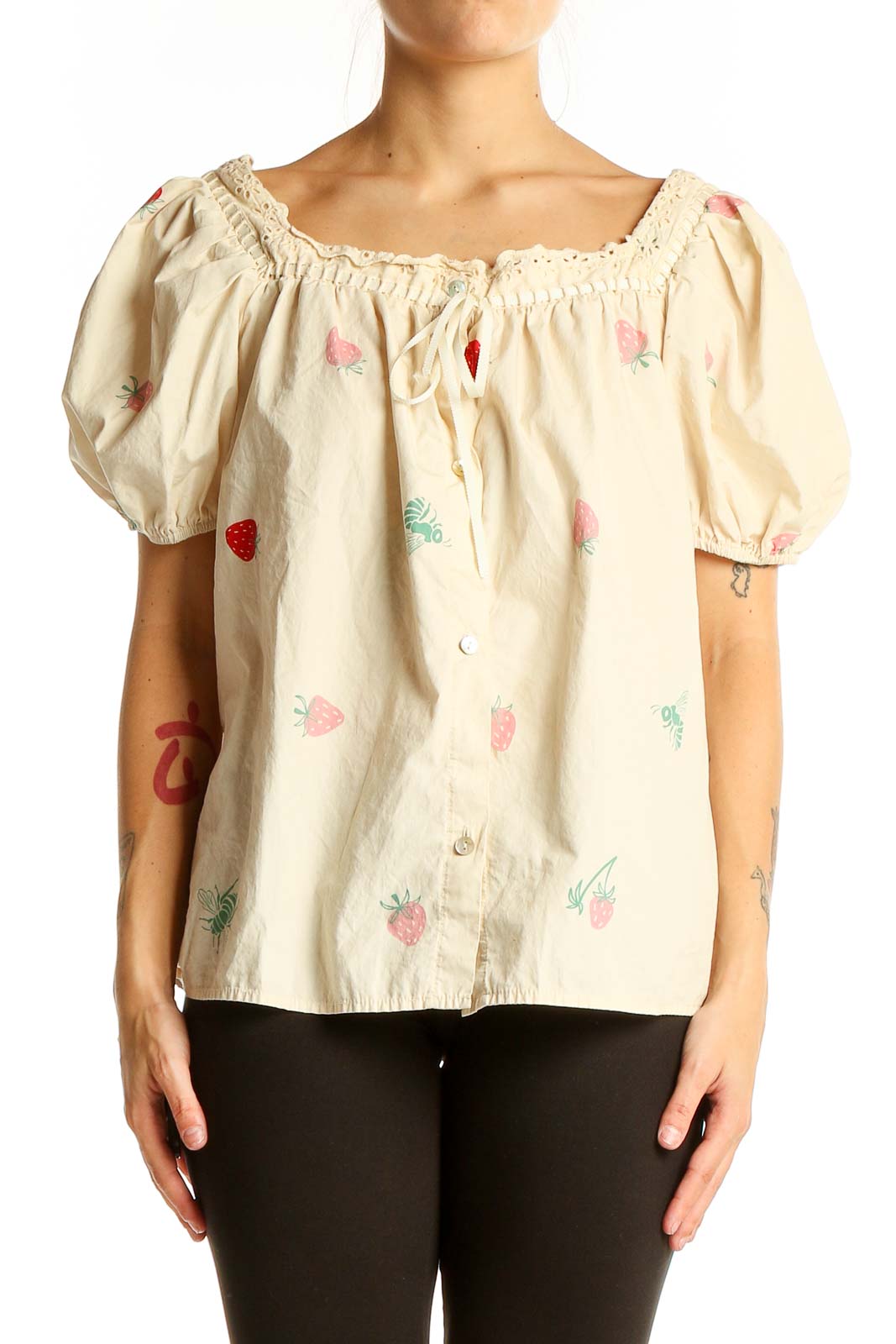 Front view of Saint Geraldine cream cotton top with strawberry print and puff sleeves