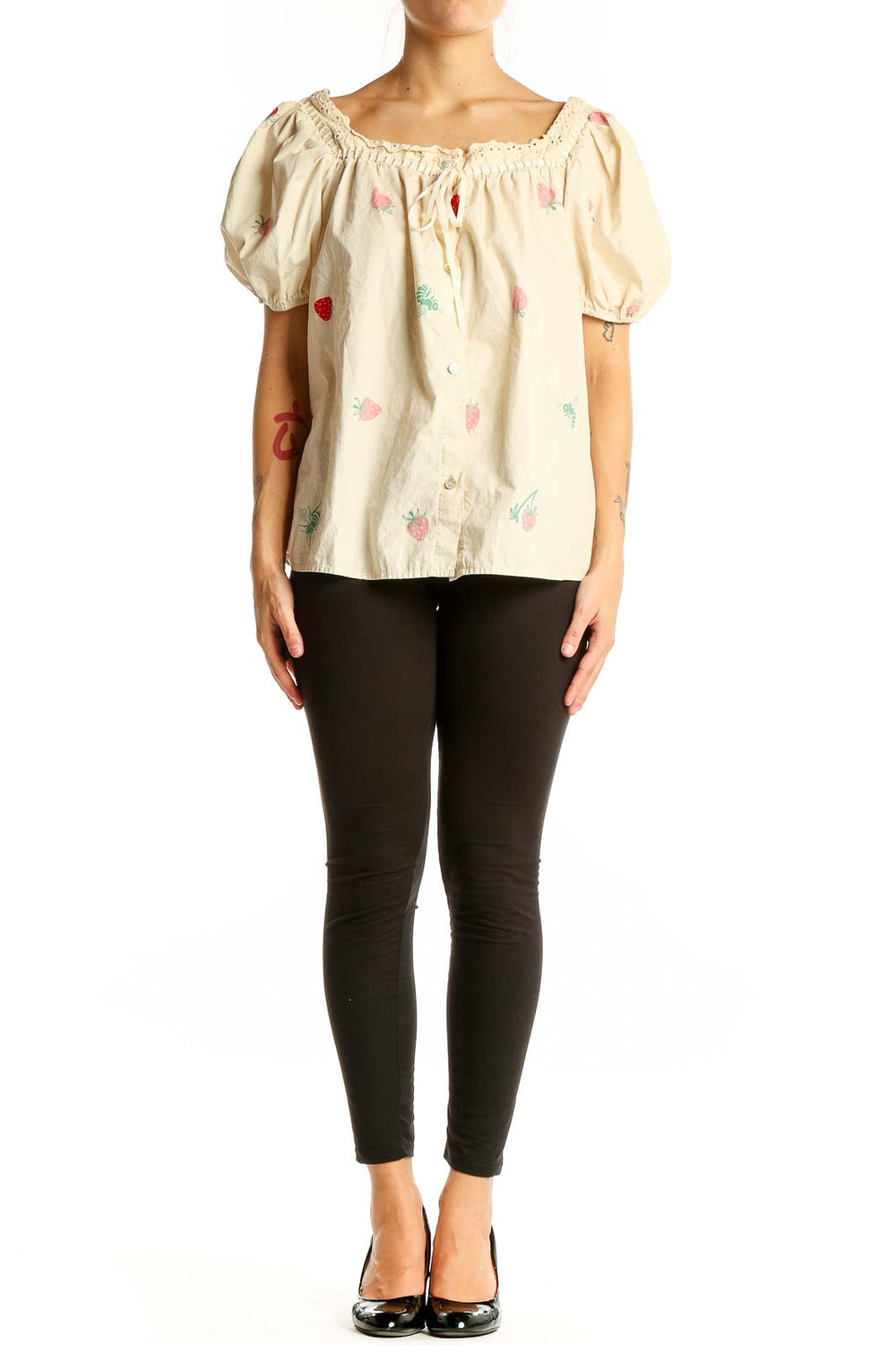 Front view of Saint Geraldine cream cotton top with strawberry print and puff sleeves