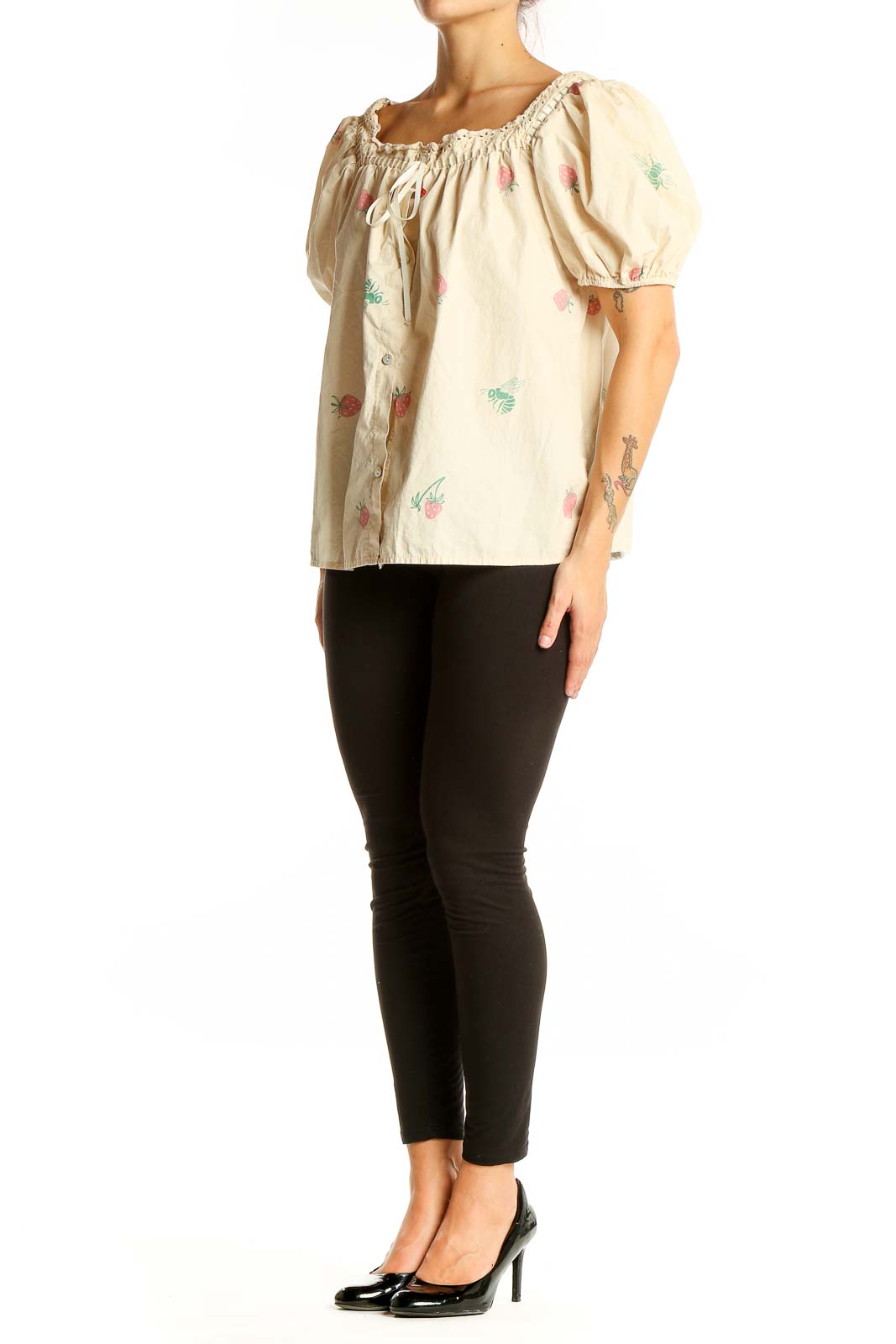 Front view of Saint Geraldine cream cotton top with strawberry print and puff sleeves