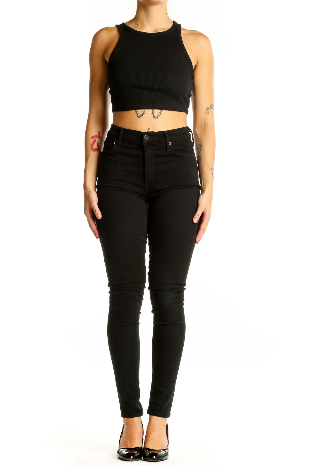 Front view of Citizens of Humanity black high-waisted skinny jeans on model