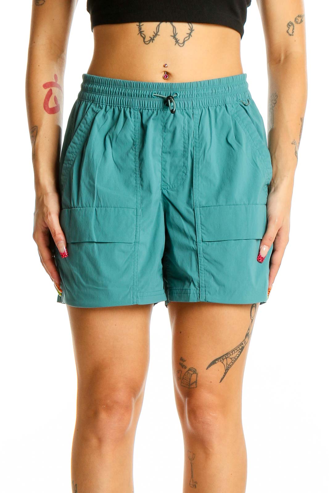 Front view of teal REI COOP activewear shorts with elastic waistband and front pockets