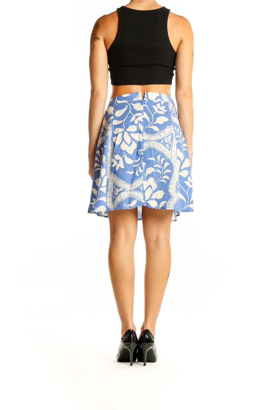 Back view of Marine Layer blue floral A-line skirt on model