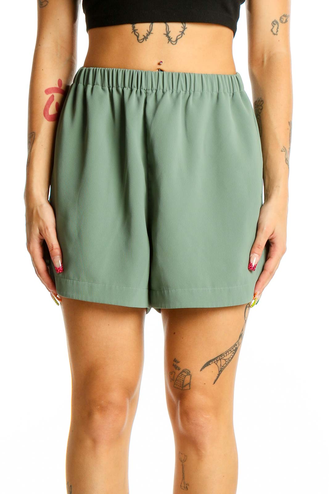 Front view of sage green NAP polyester shorts with elastic waistband